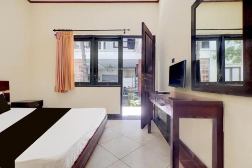 Letto o letti in una camera di Dancenter Jc Boutique Hotel