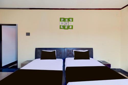 Letto o letti in una camera di Dancenter Jc Boutique Hotel