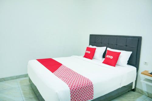Кровать или кровати в номере Dancenter Kanajiwa Guesthouse 1