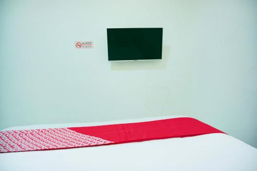 Телевизор и/или развлекательный центр в Dancenter Kanajiwa Guesthouse 1
