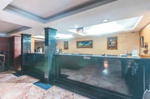 Fotografie z fotogalerie ubytování OYO 94759 Hotel Taman Cibinong v destinaci Kandangsapi Tiga