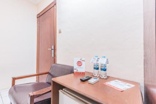 Fotografie z fotogalerie ubytování OYO 94759 Hotel Taman Cibinong v destinaci Kandangsapi Tiga