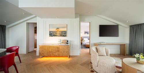 a living room with a couch and a chair at Hyatt Regency Zadar in Zadar