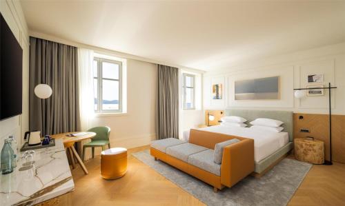 a hotel room with a bed and a desk at Hyatt Regency Zadar in Zadar