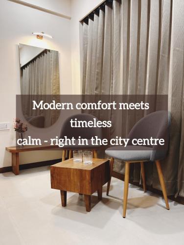 a modern comfort meets timeless calm right in the city centre at Krushnkunj Executive in Kolhapur