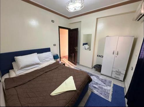 Postel nebo postele na pokoji v ubytování Zain Pyramids Hotel