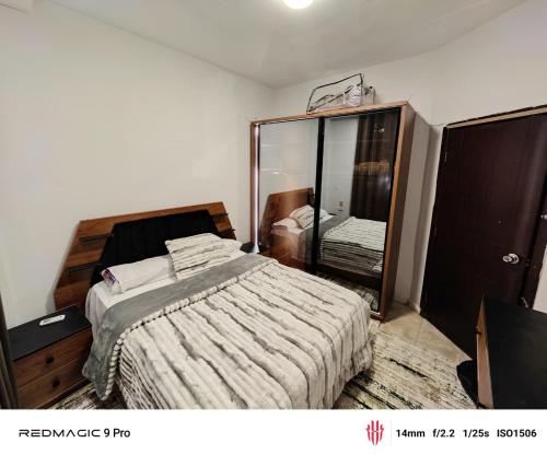 Ένα ή περισσότερα κρεβάτια σε δωμάτιο στο فيلا علي