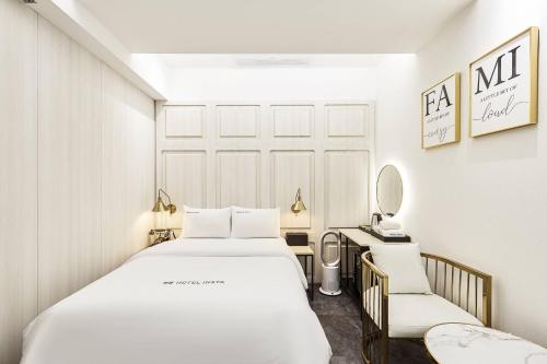 Cama o camas de una habitación en HotelInsta Main Branch