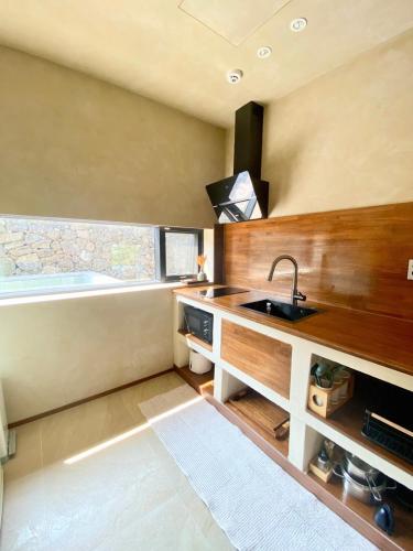 a kitchen with a sink and a bath tub at 오를 Orle in Kama-ri