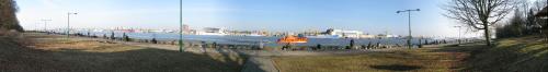 a body of water with a boat in the water at Palva in Klaipėda