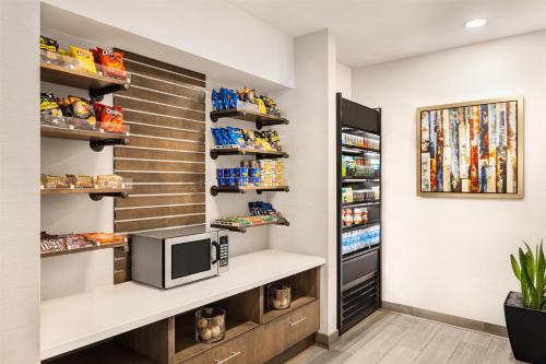 a walk in pantry with a television and snacks at Hyatt Place Keystone - Dillon in Keystone