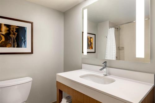 a bathroom with a sink and a toilet at Hyatt Place Keystone - Dillon in Keystone