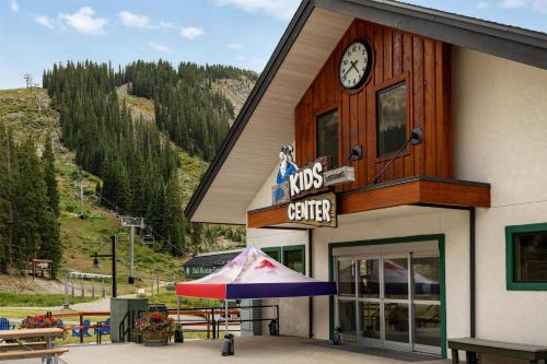 a mds center building with a clock on it at Hyatt Place Keystone - Dillon in Keystone