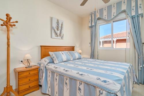 Postel nebo postele na pokoji v ubytování Ático en Torrox costa