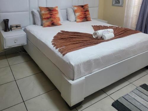 Postel nebo postele na pokoji v ubytování Hadassa Lodge