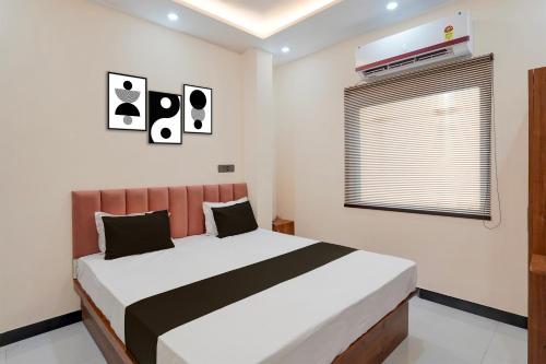 Katil atau katil-katil dalam bilik di Hotel O The Great Hotel And Restaurant