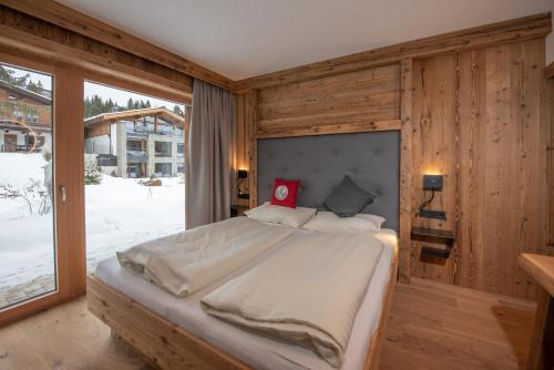 Ένα ή περισσότερα κρεβάτια σε δωμάτιο στο Chalet Königsleiten 297A