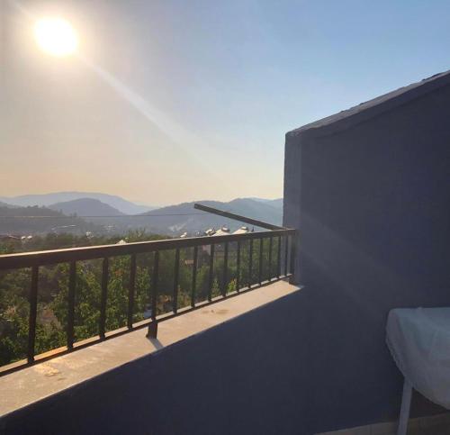 a balcony with a view of the mountains at Deka apartments 7 in Fethiye