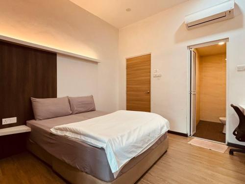 Ένα ή περισσότερα κρεβάτια σε δωμάτιο στο Spacious Home for Families, COMFY HILL