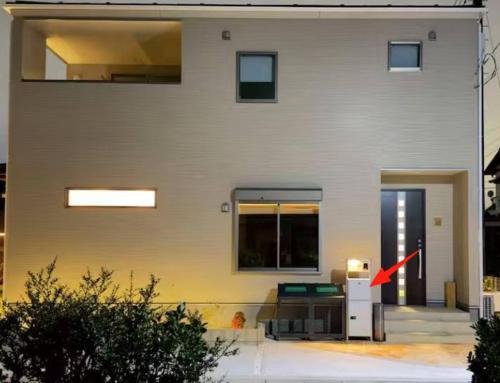 a red arrow points to the door of a house at The NANAKO in Abiko