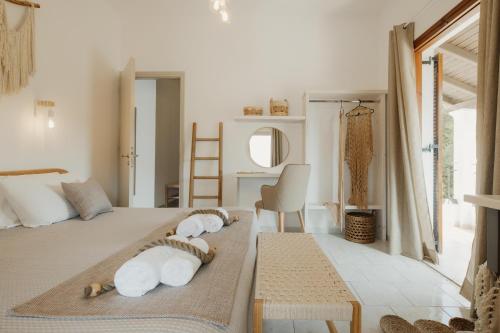 Katil atau katil-katil dalam bilik di Goudelis Apartments