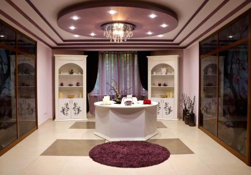 a dressing room with a table and a chandelier at Multi Rest House in Tsaghkadzor