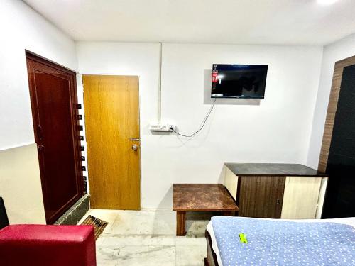 TV a/nebo společenská místnost v ubytování Hotel Royal Stay