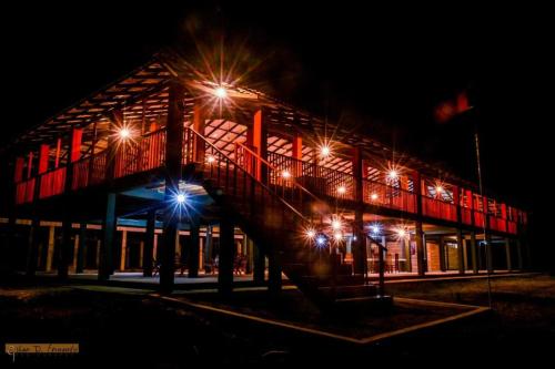 a building with lights in front of it at night at KAYJAY WILD WILPATTU in Wilpattu