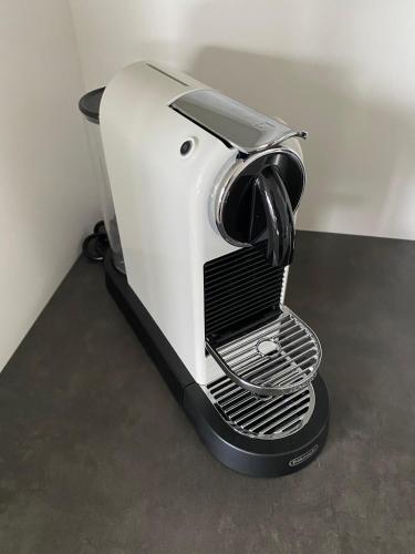 a white toaster sitting on top of a counter at Zweite Heimat in Lochau