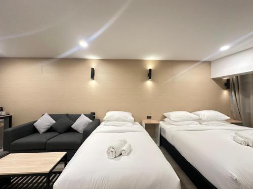 Ένα ή περισσότερα κρεβάτια σε δωμάτιο στο EbS Residence Chaweng