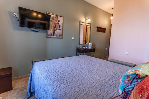 Postel nebo postele na pokoji v ubytování Guesthouse Iris