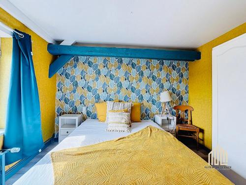 Cama o camas de una habitación en Suite Maëlle - Évasion & Confort