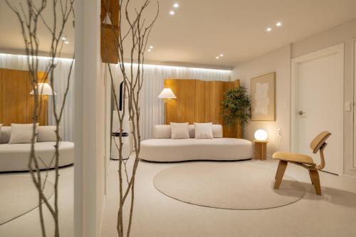 a bedroom with a bed and a table and a chair at Harangae in Seoul