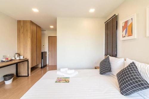 Ένα ή περισσότερα κρεβάτια σε δωμάτιο στο Casa Luxe Hotel and Resident