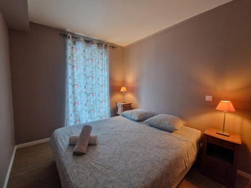 Postel nebo postele na pokoji v ubytování Puy-de-Dôme #Hypercentre