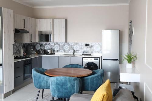 Dapur atau dapur kecil di Luxury Modern Apartment Prime Midrand Location