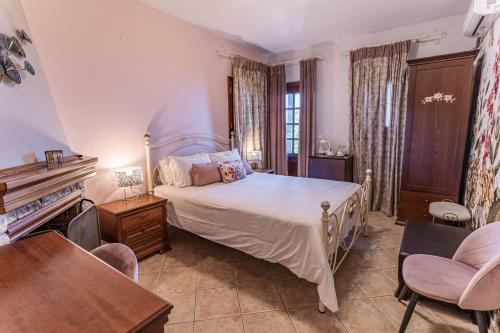 Postel nebo postele na pokoji v ubytování Guesthouse Iris