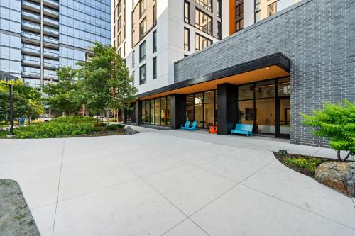 a building with blue chairs in front of it at 4BR Corporate Suite Central and Modern in Chicago