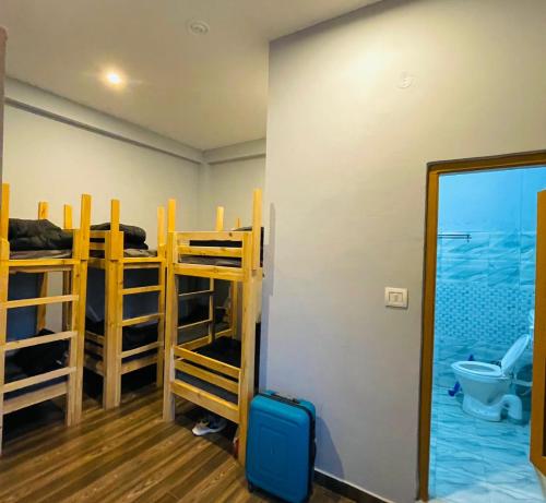 Ένα ή περισσότερα κρεβάτια σε δωμάτιο στο Wabi Sabi Hostel