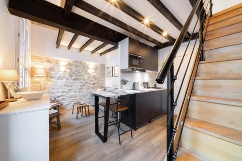 Foto Le Petit Loft - Joli Duplex - Climatisation 1