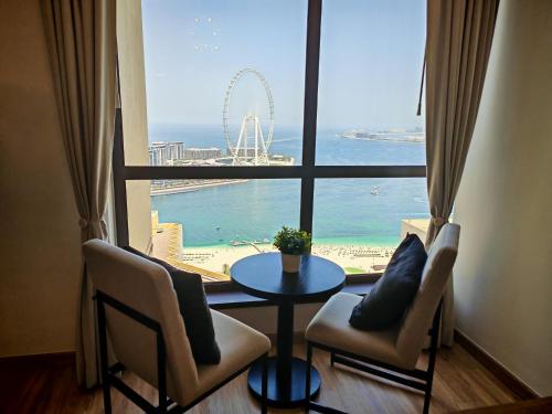 Deluxe Spacious 2BR on JBR Beach, Full Dubai Eye and Panoramic Sea Views - By Sunkised Holiday Homes