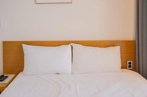 The Ocean by Owners hotel Yangyangにあるベッド