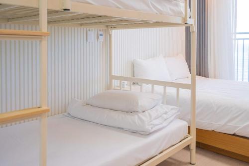 The Ocean by Owners hotel Yangyangにあるベッド