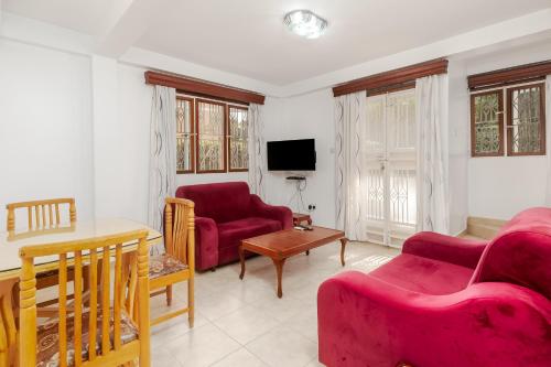Posezení v ubytování Corinya Serviced Apartments
