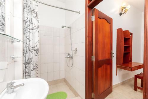 Koupelna v ubytování Corinya Serviced Apartments