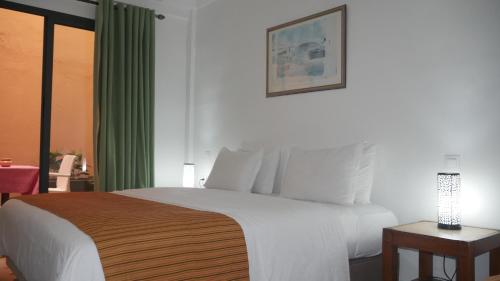 Rose Valley Hotelにあるベッド