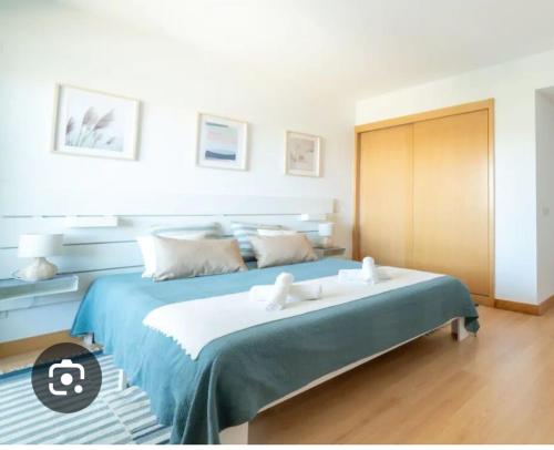 Ένα ή περισσότερα κρεβάτια σε δωμάτιο στο Homestay Cascais