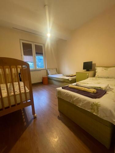 Postel nebo postele na pokoji v ubytování VEZO Apartment