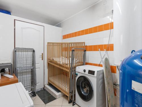 a laundry room with a washing machine in it at Holiday Home Sezímky by Interhome in Stvolínky