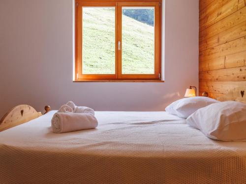 Apartment Rosablanche E 107 by Interhomeにあるベッド
